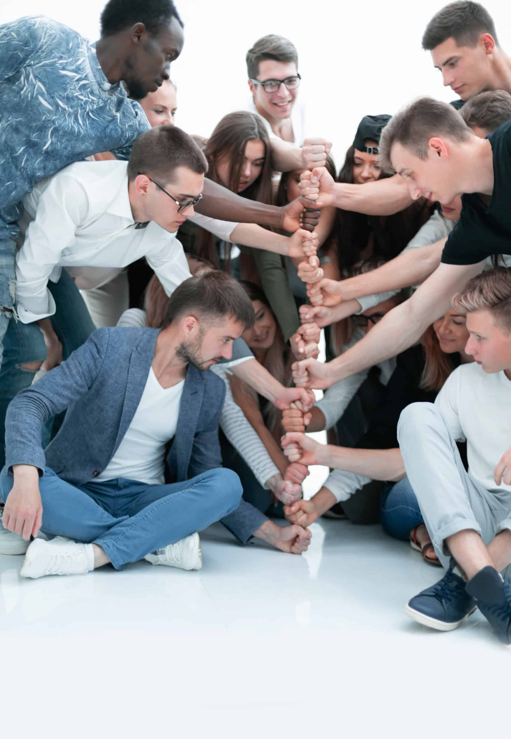 Group of students forming a hand tower