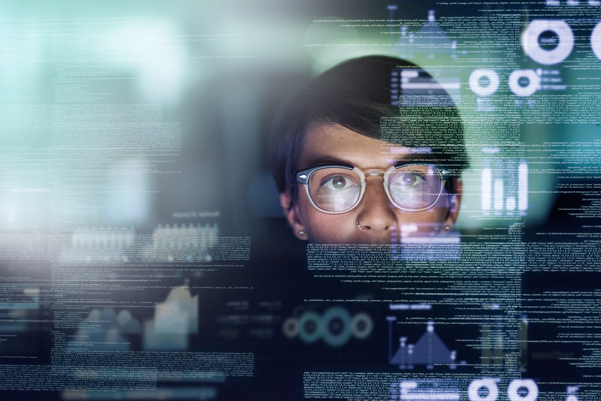 Developer looking at code on a computer screen