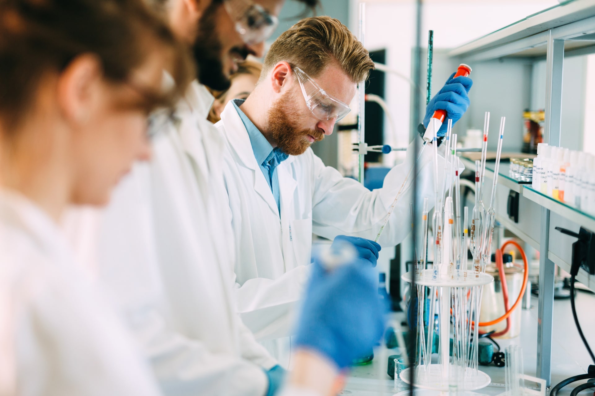 Lab techs working in pharmacy lab